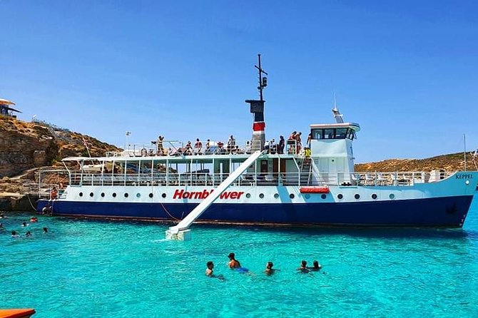 Malta: Comino, Blue Lagoon & Caves - swim, snorkel & slide - The optional speedboat trip to the caves
