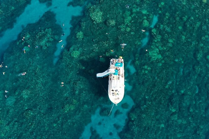 Maui: Molokini & Turtle Town Snorkel & Waterslide Adventure - Lunch, drinks, and the onboard rhythm