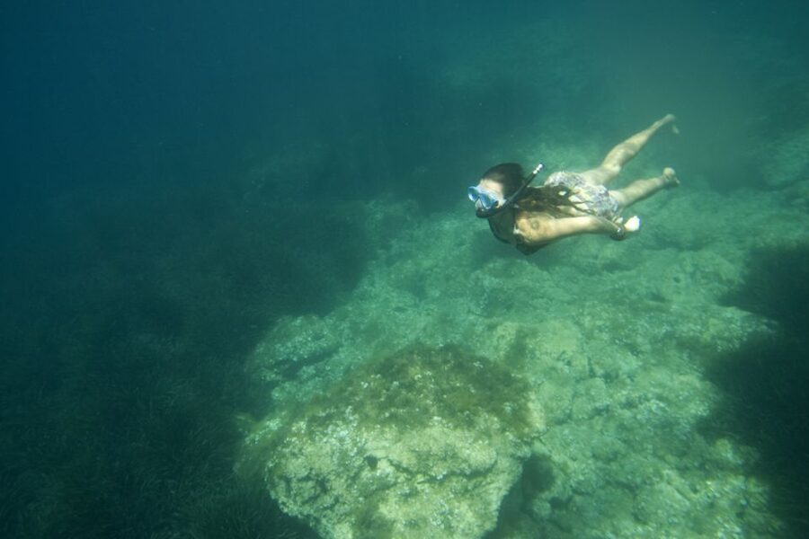 Menorca: Kayak and Marine Reserve Snorkeling Adventure - Paddling beneath La Mola de Fornells
