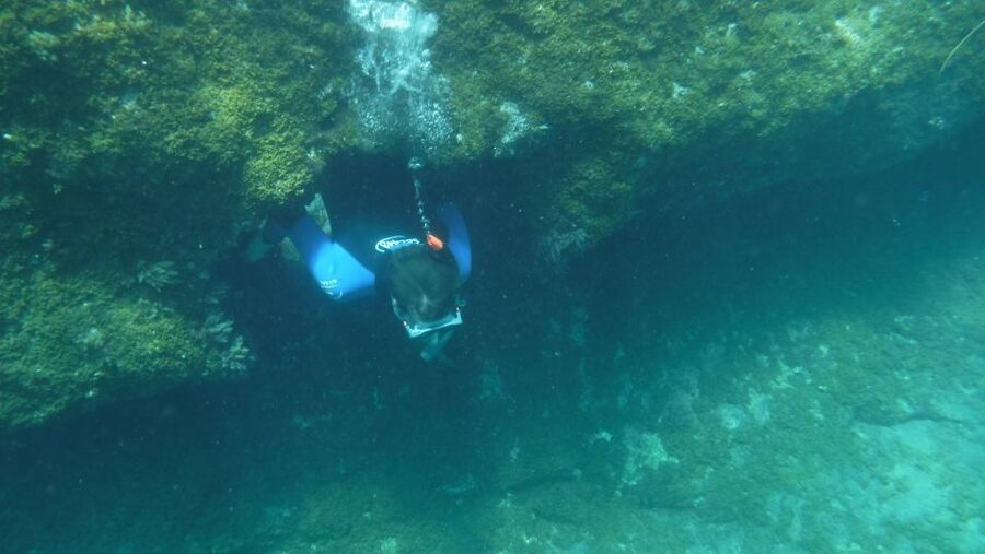 Mogán: Guided Kayak to Caves and Snorkeling Tour - Cave entrances and volcanic rock