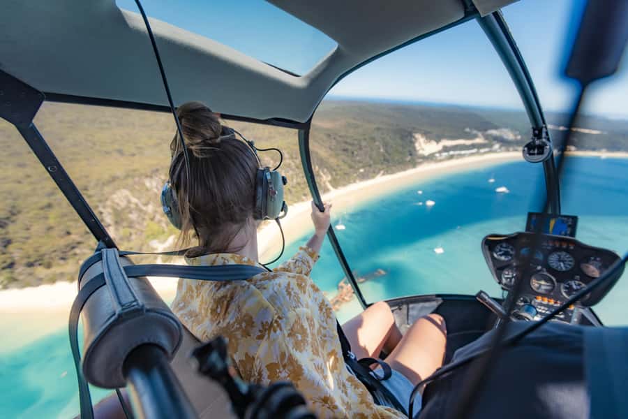 Moreton Island: Tangalooma Snorkel Tour with Helicopter Tour - Arriving at Tangalooma with a full afternoon ahead