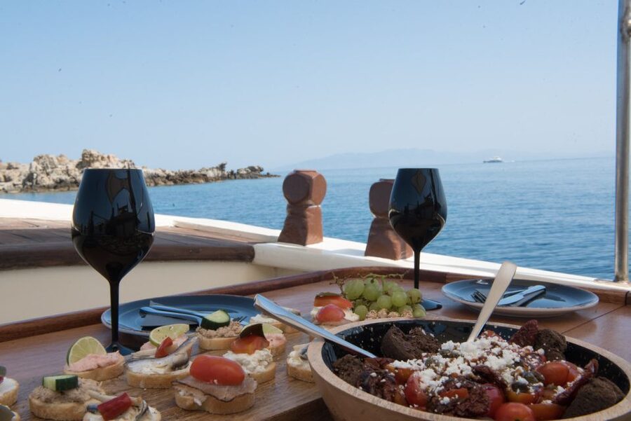 Mykonos: Private Cruise by Wooden Boat with Snorkeling - Sun, wind, and comfort on the water
