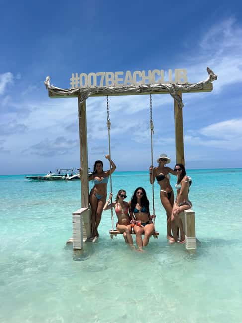 Nassau: Pigs, Snorkel, Turtles, Lunch, Private Beach Club - Feeding the pigs in shallow water