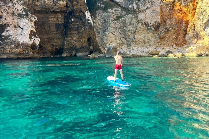 Paddle Board Paradise: Magical Snorkel & Cave Exploring SUP Tour - Snorkeling through the San Antonio sea caves