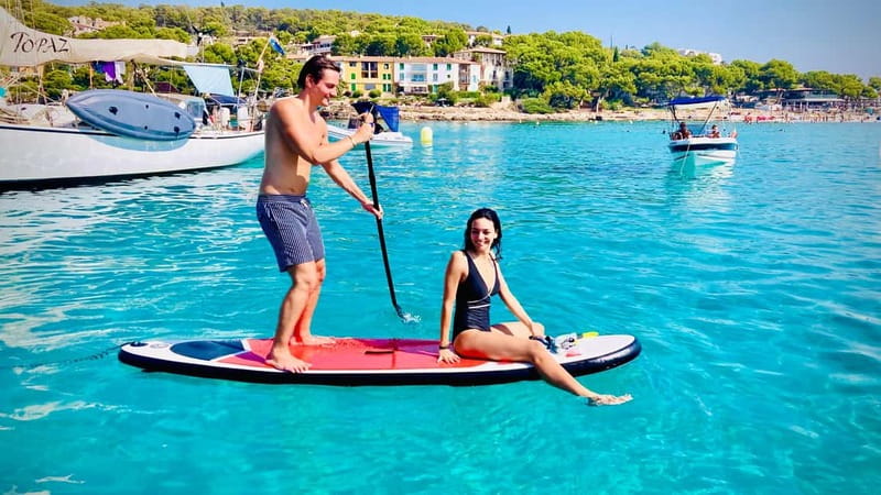 Palma de Mallorca: Private Boat Tour with Snorkel and Paddle - Snorkeling, swimming, and the underwater camera