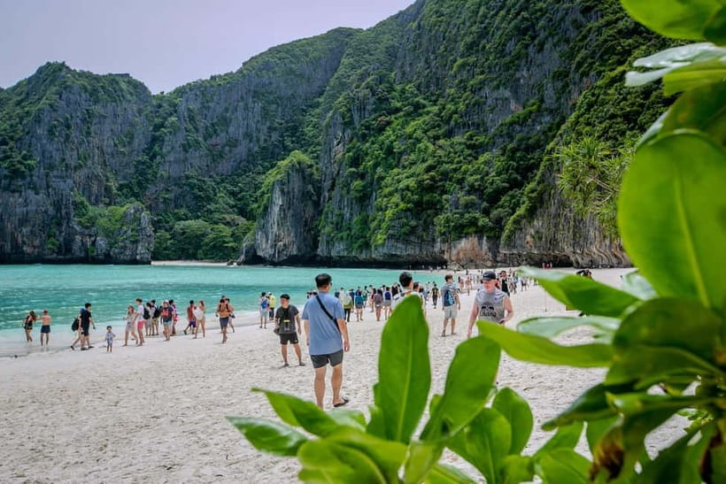Phi Phi: 7 Island Longtail Boat Snorkeling Tour with Sunset - Maya Bay brings the famous scenery, with a crowd attached