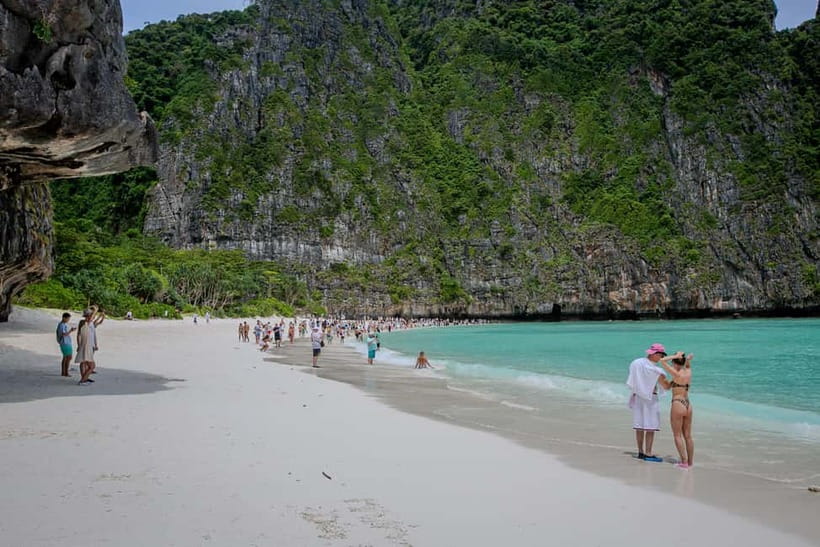 Phi Phi: 7 Island Longtail Boat Snorkeling Tour with Sunset - Food, water, and the longtail boat setup