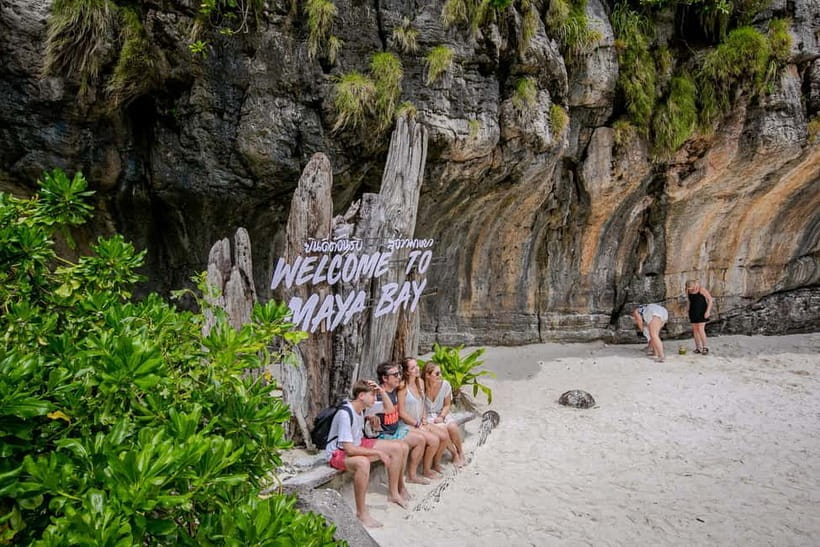 Phi Phi: 7 Island Longtail Boat Snorkeling Tour with Sunset - Pileh Lagoon is the first major swim