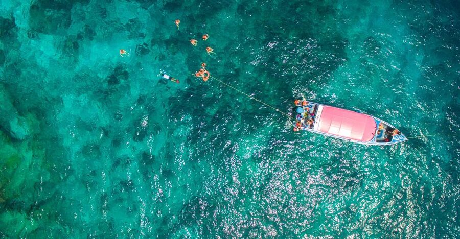 Phuket: Coral Island Longtail Boat Cruise with Snorkeling - Lunch at a local restaurant