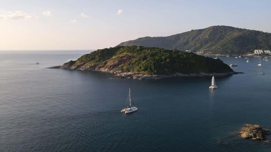 Phuket: Coral Island Snorkeling & Promthep Sunset Dinner - Dinner on deck as the light changes