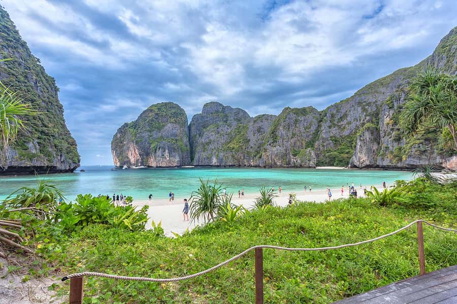 Phuket: Relaxed Phi Phi & Khai Islands Beach Snorkeling Tour - Khai Nai Island and the sunset finish