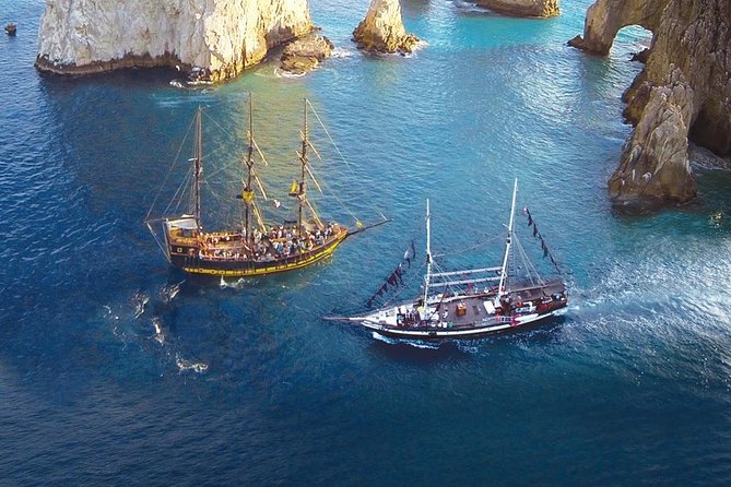 Pirate Ship Snorkel and Lunch Cruise in Los Cabos - Snorkeling, rope jumping, and a crowded water window