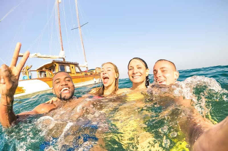 Positano: Boat Adventure, Caves, Beaches, Snorkeling, Amalfi - Starting at Positano’s ferry dock