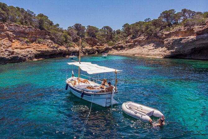 Private 4-hour Mediterranean Boat Tour in Ibiza with Snorkeling - Snorkeling, paddleboarding, and time in the water