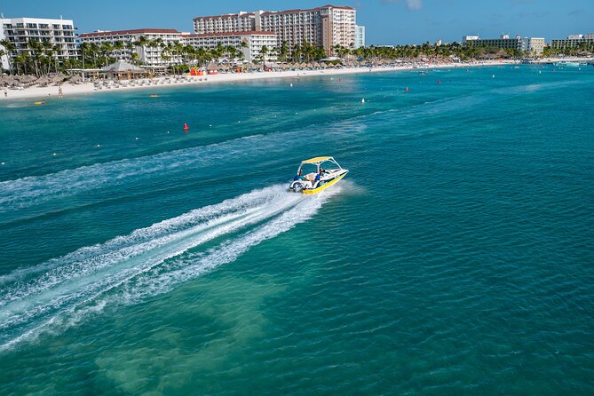 Private Boat & Snorkeling Adventure on Aruba’s Crystal Coast - Shade, music, and drinks back on board