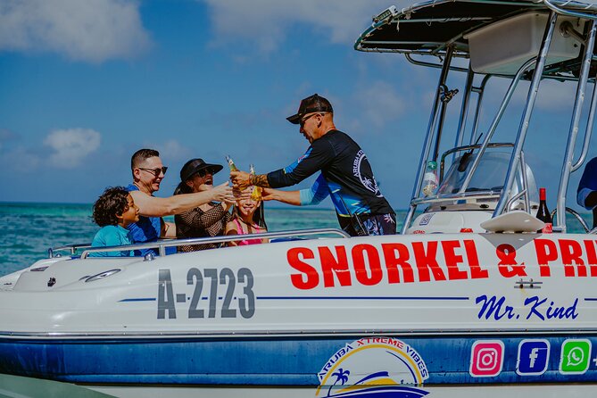 Private Snorkeling and Boat Riding Experience in Aruba - Snorkeling equipment and the underwater scooter