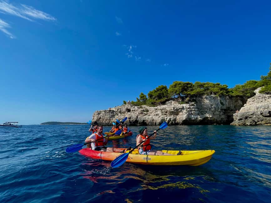 Pula: Cave, Canyon and Island Kayak Tour Snorkel&Explore - Entering Grotta di Quarzo by kayak