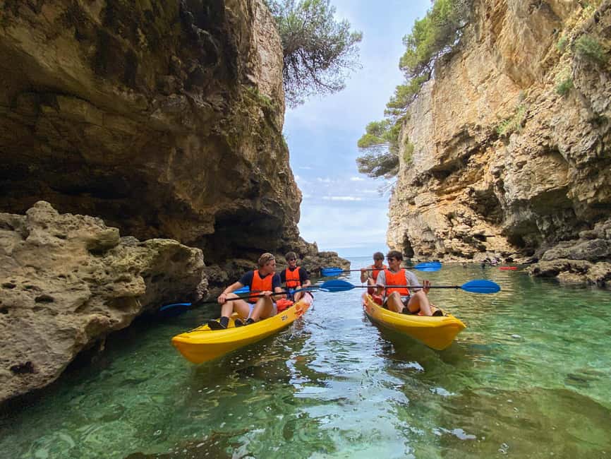 Pula: Cave Kayak Tour, Snorkeling and Island Jumping - Cliff jumping, with no pressure to participate