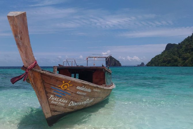 Railay and 4-Island Sunset Speedboat Cruise with Night Snorkel - Lunch, fruit, drinks, and the sunset snack