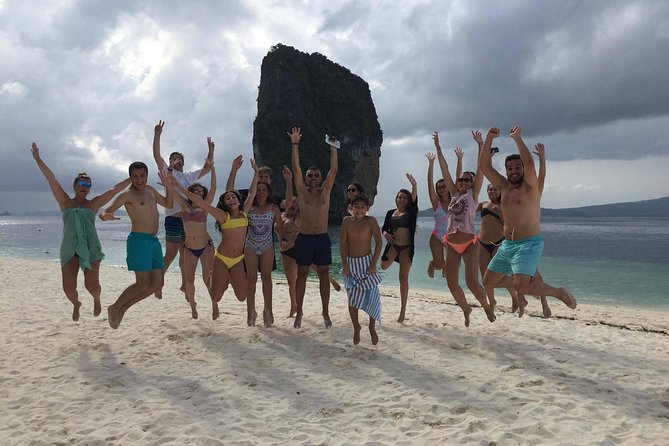 Railay and 4-Island Sunset Speedboat Cruise with Night Snorkel - Phra Nang Cave Beach and the limestone cliffs of Railay