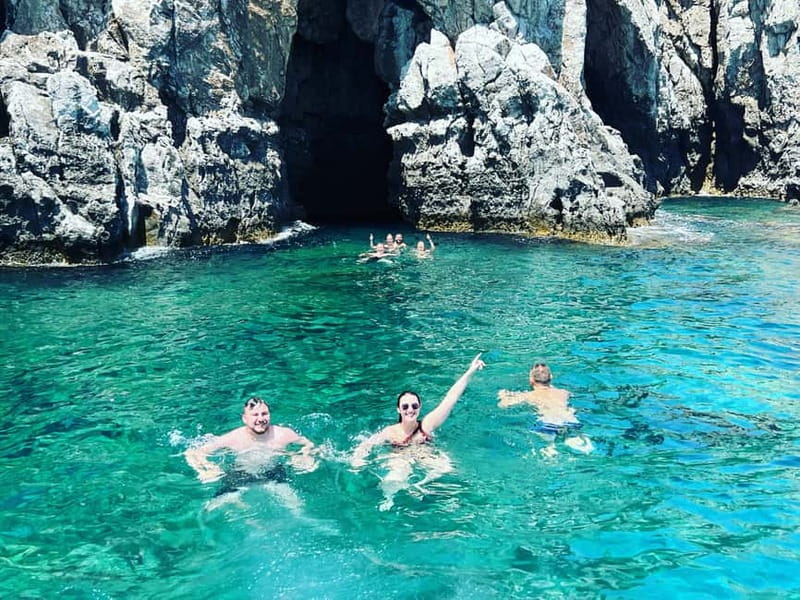 Rhodes: Anthony Quinn Bay & Sea Caves Snorkeling Cruise - Dolphins on the return to the marina