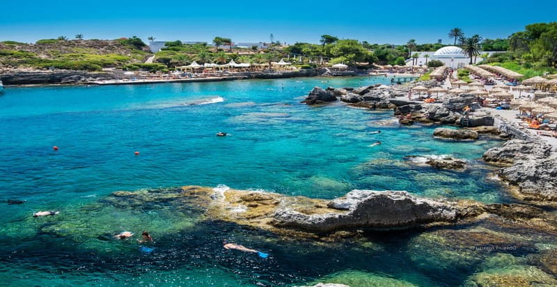 Rhodes: Anthony Quinn Bay & Sea Caves Snorkeling Cruise - Traganou’s gravel beach and rocky caverns