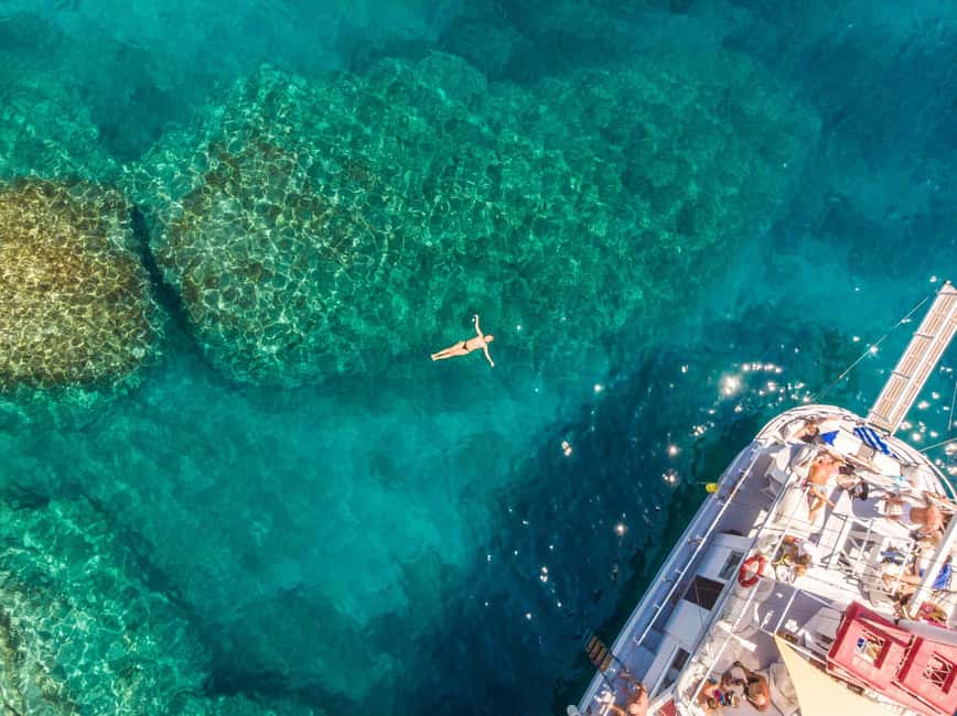Rhodes: Boat Tour with Snorkeling, Gourmet Buffet & Open Bar - Starting at Mandraki Port on the Romantika