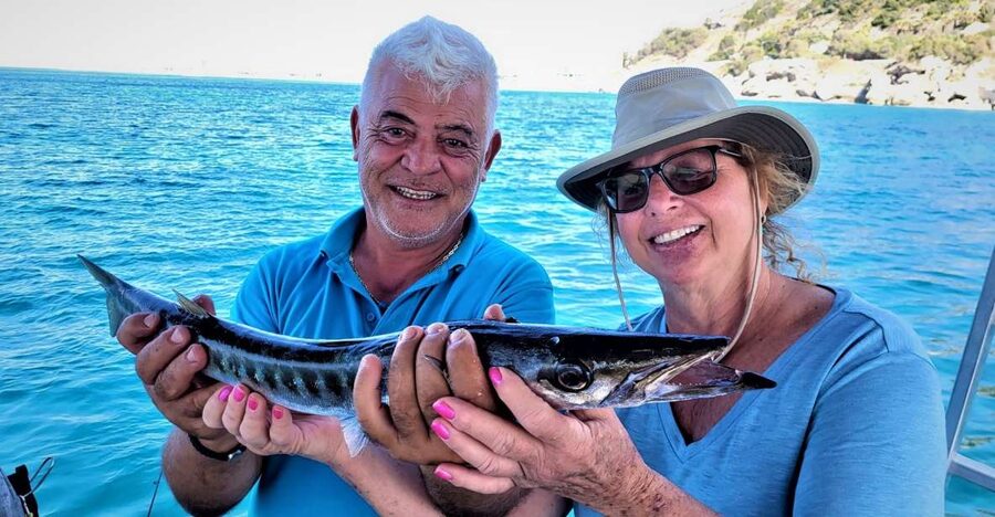 Rhodes: Fishing Trip, Snorkelling, BBQ, & Professional Guide - A fishing trip that ends with lunch