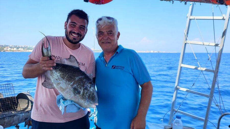 Rhodes: Fishing Trip, Snorkelling, BBQ, & Professional Guide - The boat: practical comfort with a working feel