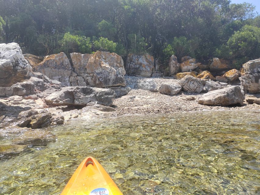 Rovinj: Golden Cape Desert Islands Kayak & Snorkeling Tour - Paddling across the Rovinj Archipelago
