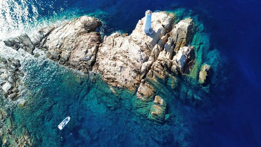 Rubber dinghy tour and snorkeling in Caprera - Leaving Cannigione and passing Capo d’Orso