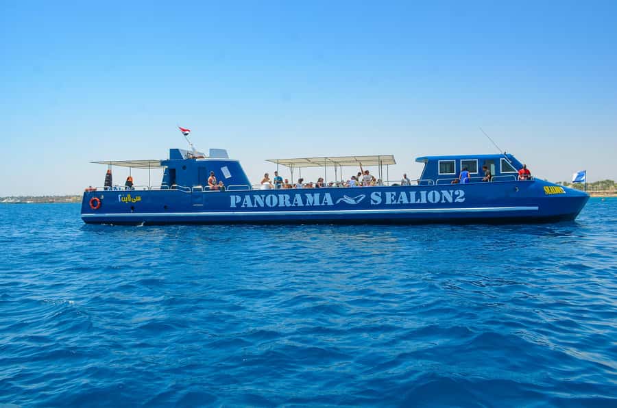 Safaga/Makadi Bay: Panorama Submarine with Snorkeling Tour - Boarding the boat and seeing the reef through glass