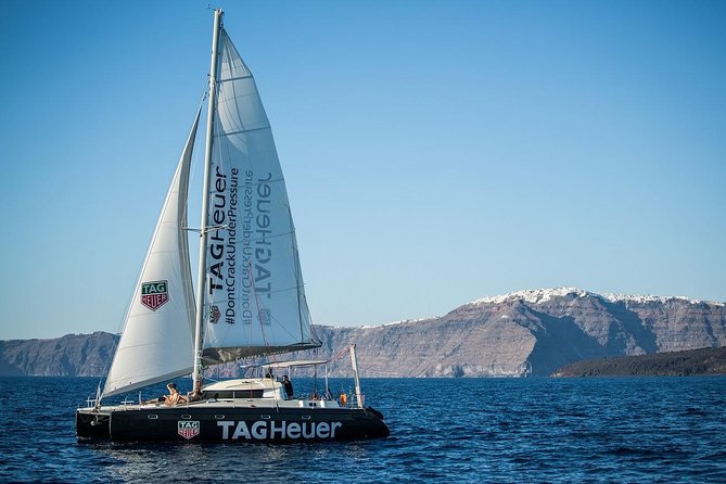 Santorini: Adventurous Catamaran Experience with Snorkeling - White Beach and Black Mountain bring the best water time