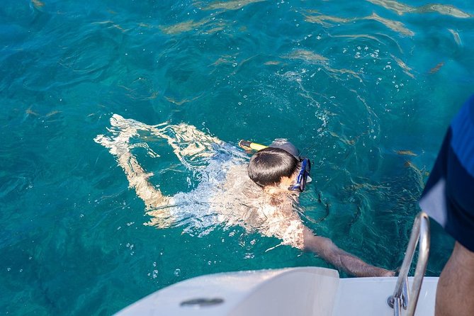 Santorini: Adventurous Catamaran Experience with Snorkeling - Hot Springs: warm water, sulphur, and realistic expectations
