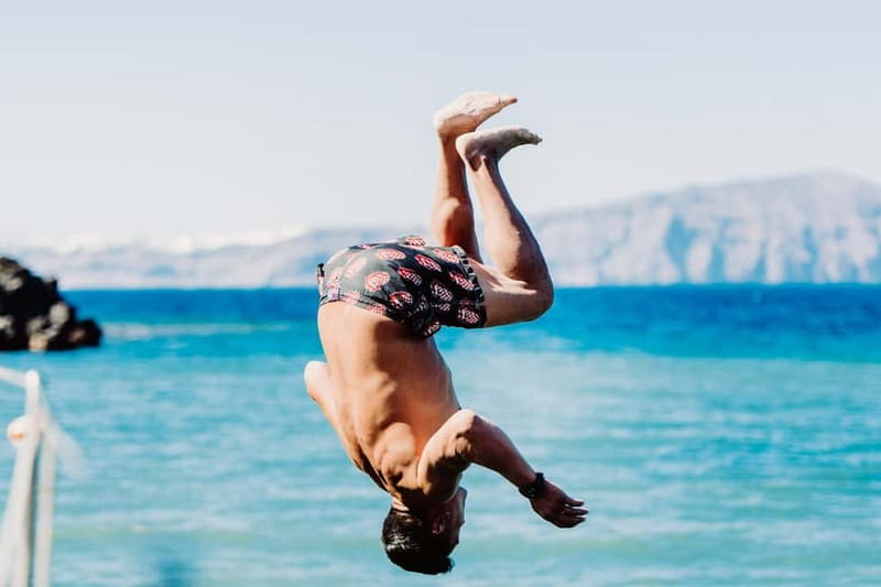 Santorini: Adventurous Catamaran Experience with Snorkeling - Lunch, drinks, and the social side of the boat
