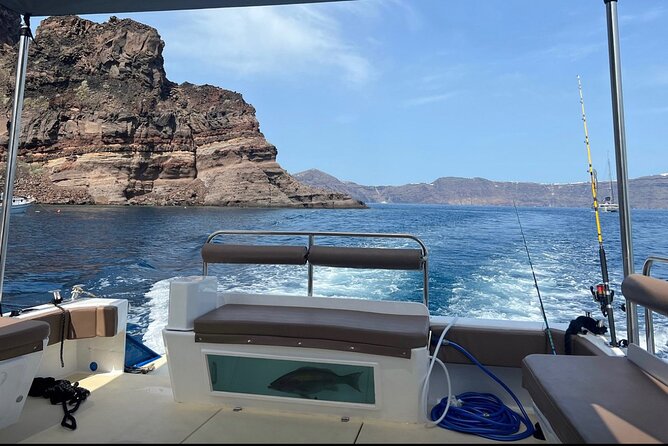 Santorini Fishing Private Cruise boat tour - BBQ, Snorkeling - Meeting Captain Makis near Ammoudiou Bay