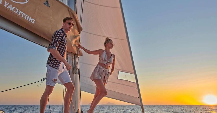 Santorini Gold Catamaran Cruise with Snorkel, BBQ & Open Bar - Red Beach, where the cliffs do the talking