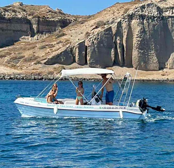 Santorini: License-Free Boat Rental with Snorkeling Gear - Santorini from the water, not the postcard