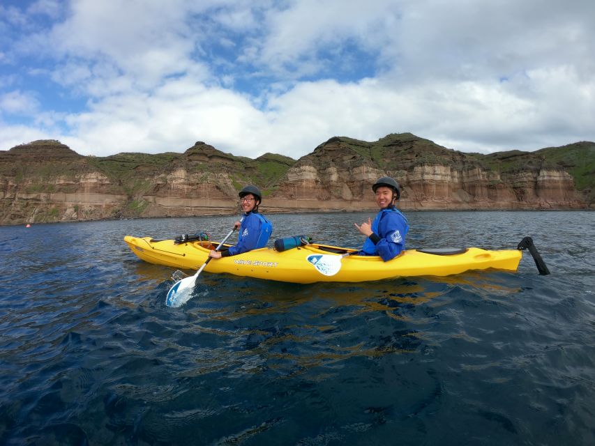 Santorini: Sea Caves Kayak Trip with Snorkeling and Picnic - Black Mountain, snorkeling, and time in the water