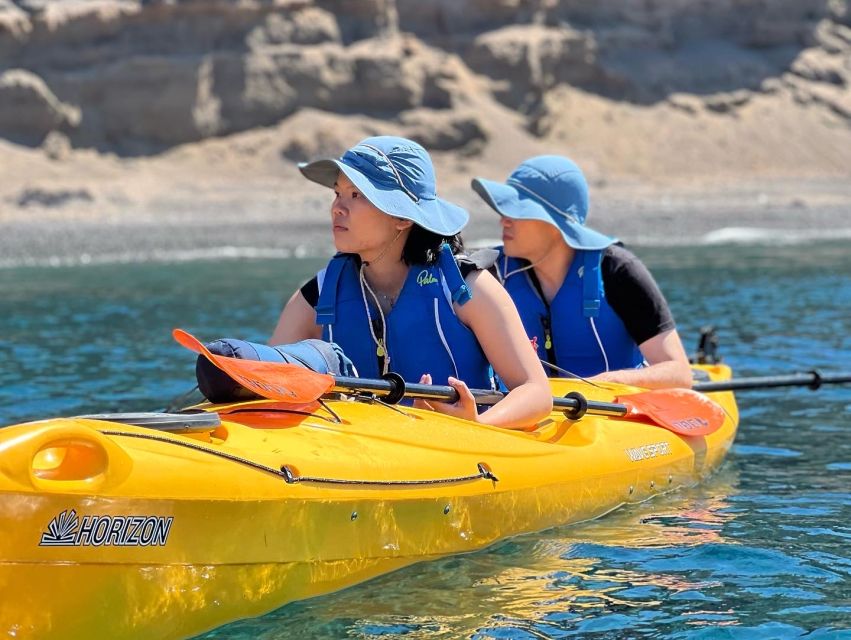 Santorini: Sea Caves Kayak Trip with Snorkeling and Picnic - White Beach and the optional cliff jump