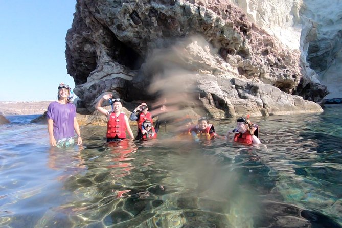 Santorini: Stand-Up Paddle and Snorkel Adventure - Snorkeling over the ocean floor