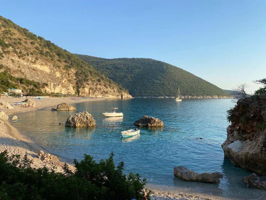 Saranda: Sea Adventure with 7 Stops, Drinks, & Snorkel Fun - Kakome Bay adds green hills and clear water