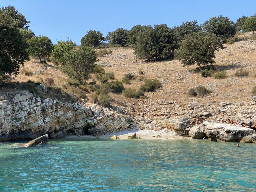Saranda: Sea Adventure with 7 Stops, Drinks, & Snorkel Fun - Rrojdhe Bay ends the route gently