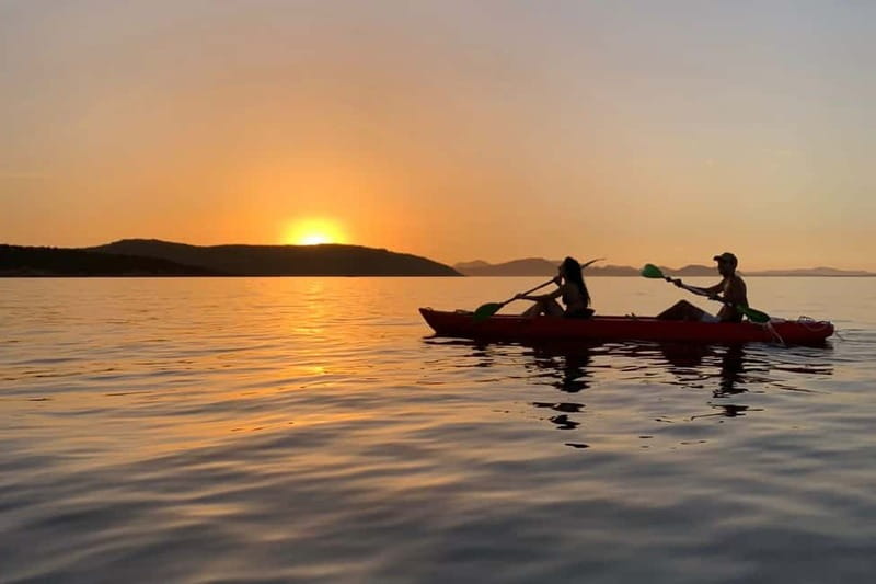 Sardinia: Sunset Kayak Tour + Snorkeling and Local Aperitif - Paddling back as the sun goes down