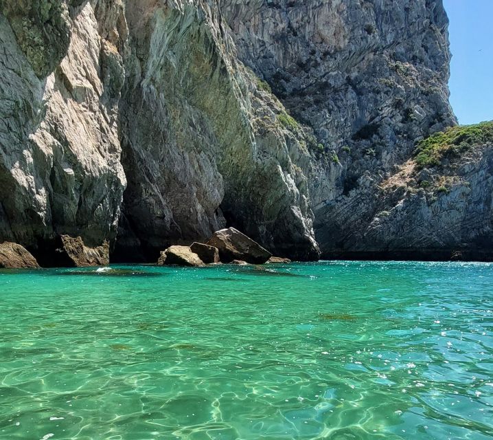 Sesimbra: Secret Bays and Beaches Boat Tour with Snorkeling - Mijona and Inferno keep the outing moving