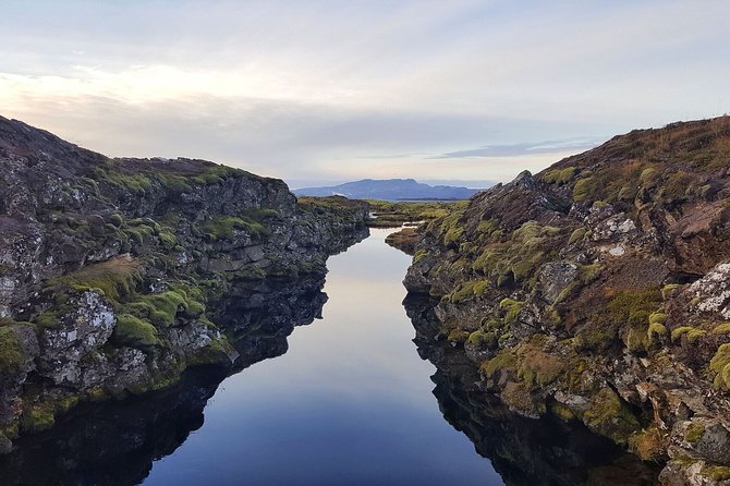 Silfra Drysuit Snorkeling Tour with Free Photos - From Reykjavik - Photos, hot chocolate, and the cold walk afterward