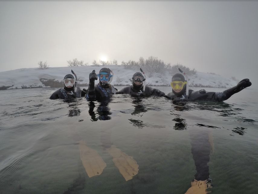 Silfra: Fissure Snorkeling Tour with Underwater Photos - Entering Silfra’s Clear Glacial Water