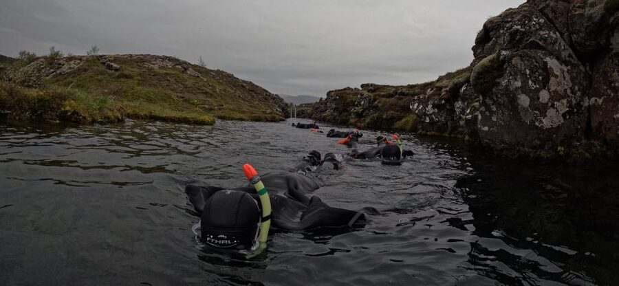 Silfra: Fissure Snorkeling Tour with Underwater Photos - Warm Drinks, Cookies, and the Slow Return