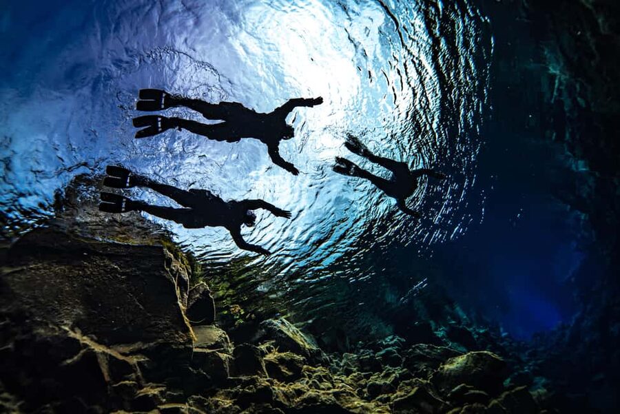 Silfra: Snorkel Between Continents. Free Professional Photos - Getting ready in a drysuit