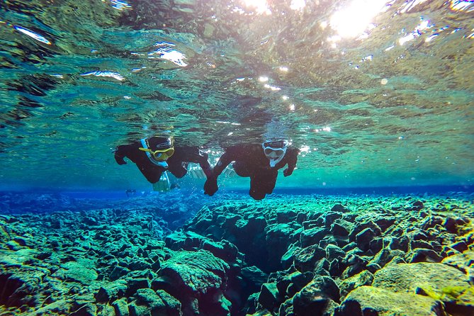 Silfra Snorkeling Between Continents Photos Included- Self Drive - Getting dressed in a dry suit
